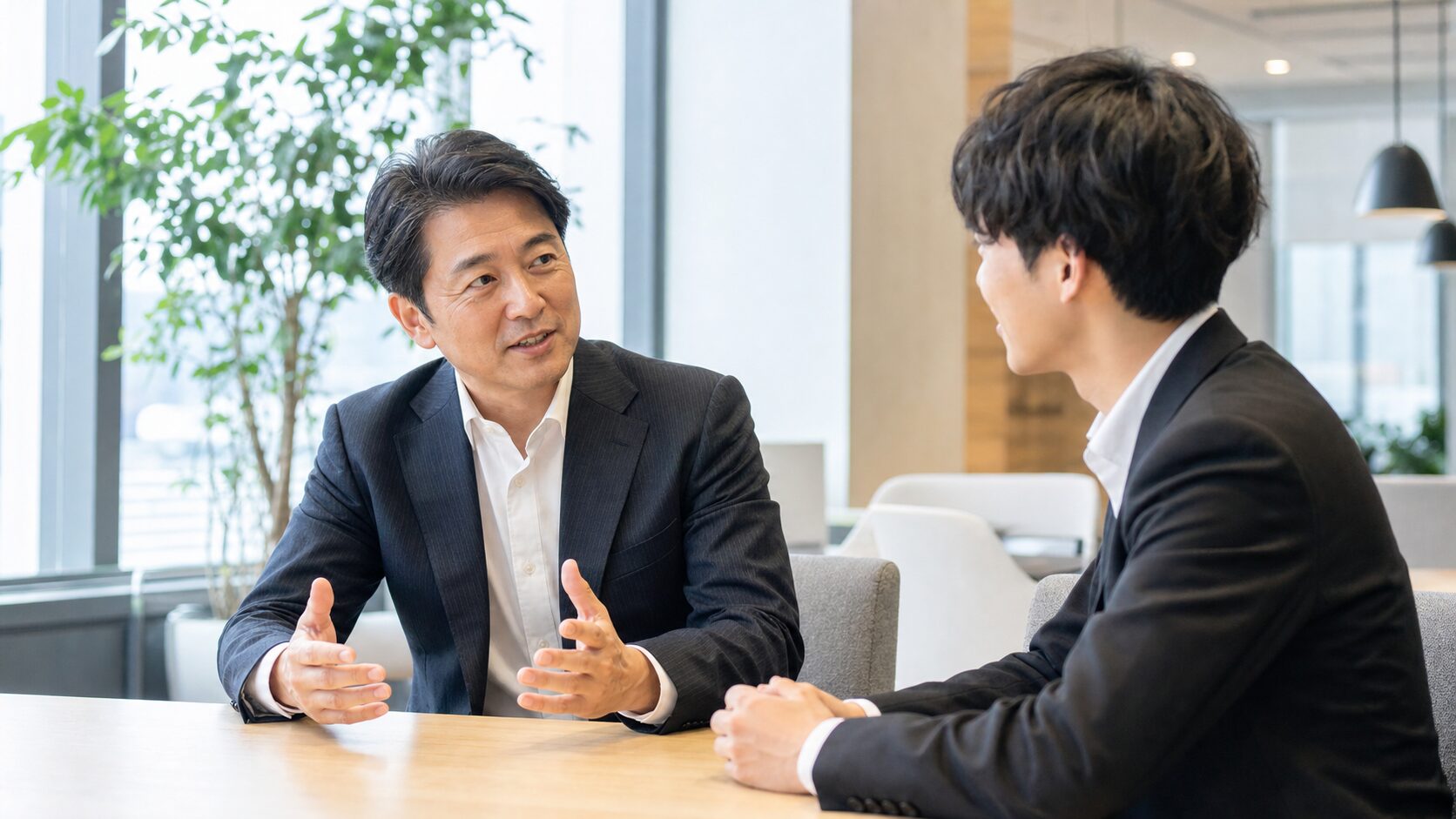 部下のモチベーションについて対話する管理職